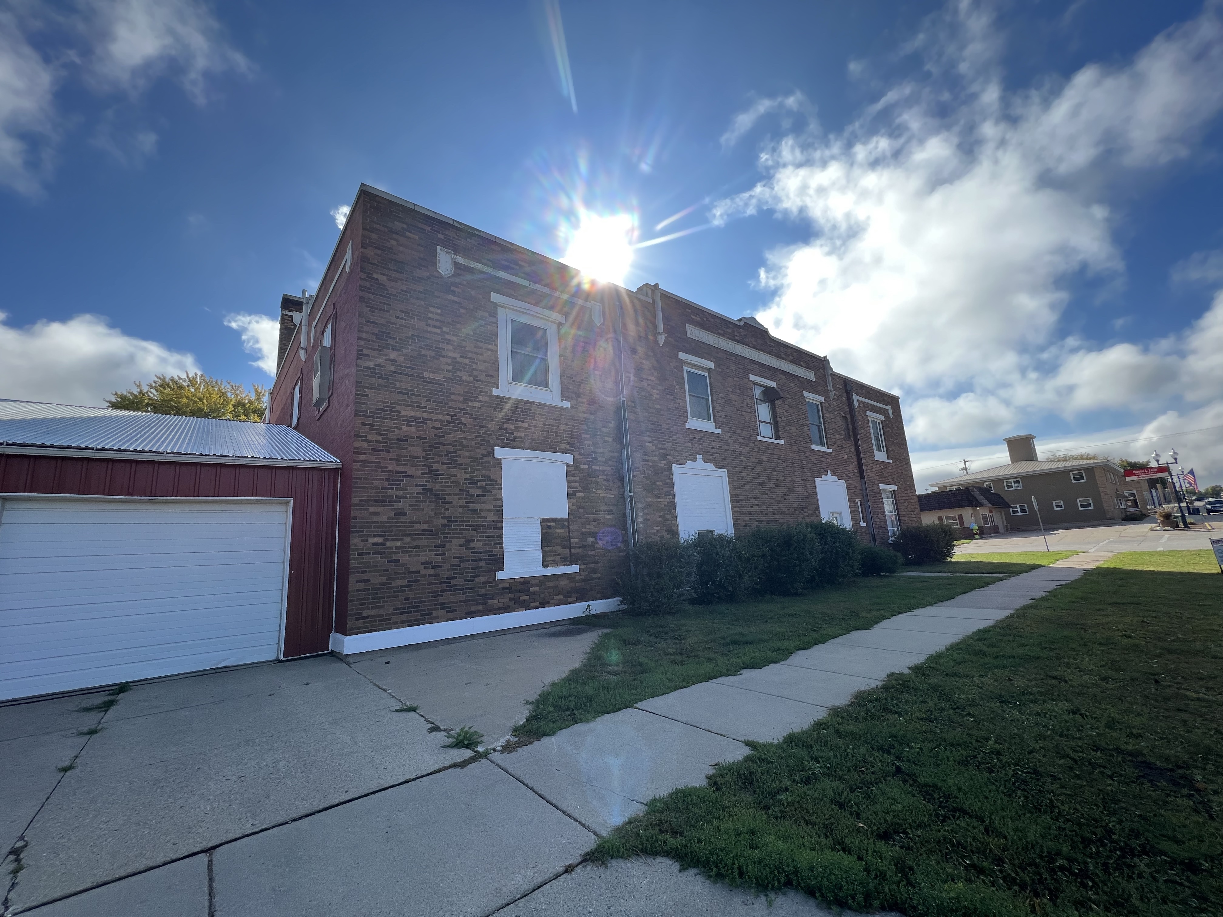 Side view of the creamery building on a sunny day in Blue Earth